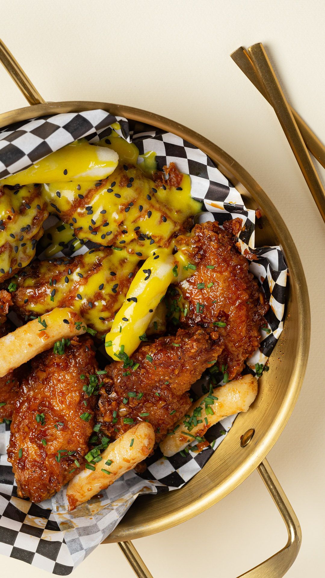 Korean-style fried chicken with cheese sauce and tteokbokki at Chikinmos Ayala